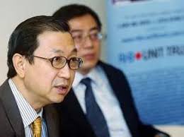 ... financial products and services managing director Ng Kwan Meng at the ... - b_p4michael