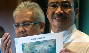 Malaysian acting transport minister Hishamuddin Hussin shows a map showing the possible flight path of the missing plane. Photograph: Ahmad Yusni/EPA - be78a08e-1113-44b7-86a3-4429ee9ad167-460x276