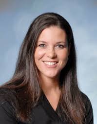 Courtesy Utah State; Erin Scholz is enjoying the challenge as an assistant coach at Utah State. - f527_endzone-27294