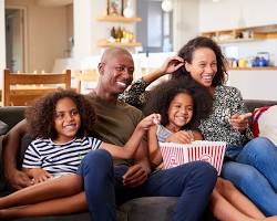 Image of Family watching movie together