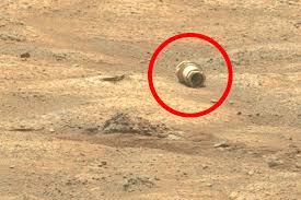 Strange 'cylinder' spotted in Mars rover image baffles Nasa fans ...