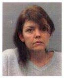 Christine Miller after she was arrested in 2009. Credit St. Louis County Prosecutor&#39;s Office. Updated at 3:45 with comments from Indian community. - Christine_Miller_060909_booking