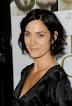 Carrie-Anne Moss (Claudia Wolf)