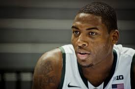 Michigan State sophomore guard Branden Dawson talks to members of the media Tuesday at MSU basketball&#39;s media day at the Breslin Center. - 11682328-large