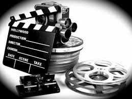Image of movie film strips and an old camera 