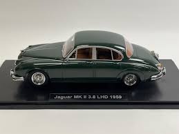 Image result for Dark Green 1959 Jaguar