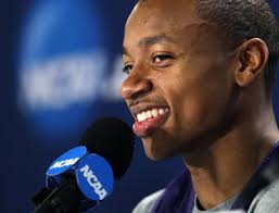 SEATTLE — Washington guard Isaiah Thomas says he&#39;ll put his name in the NBA draft but will not hire an agent at this time. - 9442873-large
