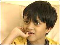 Javaid Iqbal, aged 7. Javaid and his family were delayed at three airports - _44069735_javaidiqbal_grab203i