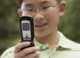 Image result for kid on phone