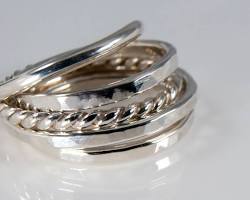 Image of stack of sterling silver jewelry