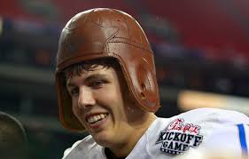 Kellen Moore #11 of the Boise State Broncos wears the Chick-fil-A Kickoff Game leather helmet after their 35-21 win over the Georgia ... - Kellen%2BMoore%2BBoise%2BState%2Bv%2BGeorgia%2B1ZRWsDTJH9Bl