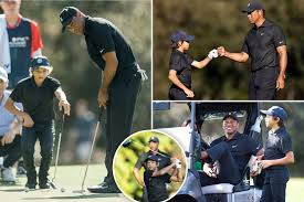 Tiger Woods back on course with son Charlie, uncanny similarity ...