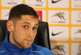 Dean Furman, the combative Bafana Bafana midfielder, wants his teammates to work extra hard when they come up against Brazil at FNB Stadium tomorrow night. - default