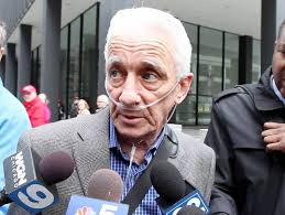 Keith Farnham leaves the Dirksen Courthouse in Chicago after his court appearance on charges of possession of child pornography. - EP-140439934