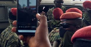 Lieutenant Colonel Mamady Doumbouya, head of the Army special forces and coup leader, waves to the crowd as he arrives at the Palace of the People in Conakry on September 6, 2021