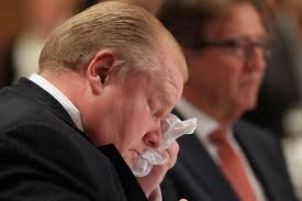 RENE JOHNSTON - Mayor Ford clears his eyes with Porter CEO Robert Deluce in the background. - 6a00d8341bf8f353ef017615fa1af9970c-pi