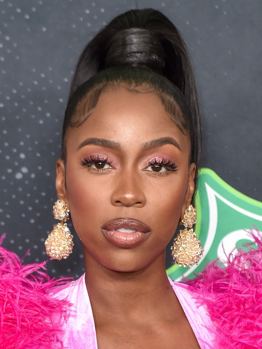 Kash Doll is an incredible female rapper. This sexy musician has many hits with lyrics detailing how she is focused on money, not men and is a boss babe dripping in designer. These Kash Doll lyrics will definitely make great captions for Instagram. Kash Doll age | Kash doll songs. #KashDoll #Rap