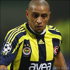 Brazilian defender Roberto Carlos has appeared in the Champions League for two different clubs, most recently playing for Fenerbahce he began with Real ... - _45027950_roberto_300_get