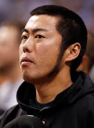 Relief pitcher Koji Uehara #19 of the Baltimore Orioles listens to the National Anthem just prior to the start of the game against ... - Koji%2BUehara%2BBaltimore%2BOrioles%2Bv%2BTampa%2BBay%2BBTQl3G1GTWMl