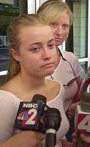 Estero High School senior Lindsay Brown, left, and her mom, Melissa Ashworth, are surrounded by media outside the federal courthouse in Fort Myers after a ... - st-student