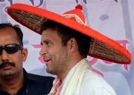 Heady mix: Modi, Rahul show headgears are a must-have on campaign trail. Congress Vice President Rahul Gandhi being felicitated with an Assamese traditional ... - rahul-2