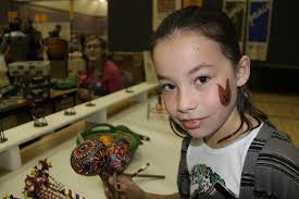 ... hand-painted wooden moracas Saturday at Ten Thousand Villages during the annual Mennonite Fall Fair. The popular event held at the Prince George Civic ... - A1003mennonitefair