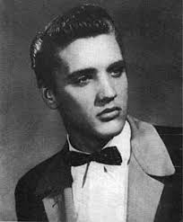 Elvis in a tuxedo. Presley in a Sun Records promotional photograph, 1954 - 220px-PresleyPromo1954PhotoOnly
