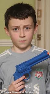 Upset: Stuart Thomson said he didn&#39;t think he was going to cause any trouble by taking the toy gun into school - article-2088756-0F86887E00000578-153_233x437