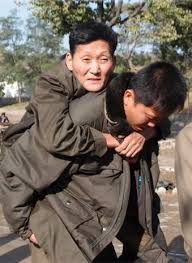 Image result for son carrying father