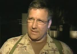 Military Spokesman Maj. Mario Couture speaks to the media on Monday, Feb. - image