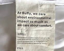 Image of Buffy comforter dry cleaning tag