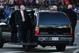 Image result for black government suv with secret service agents