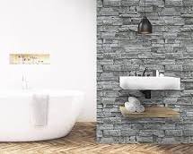 Bathroom with wallpaper feature wall behind bathtub