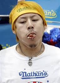 Takeru Kobayashi Associated PressTakeru Kobayashi shoves hot dogs in his mouth during Nathan&#39;s Famous Hot Dog Eating Competition on Coney Island, ... - takeru-kobayashi-ff43761a7304c840_large