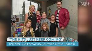 Tori Spelling’s daughter home after hospitalization with hemiplegic migraine