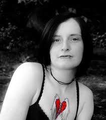 Vibrant red heart pieces held together with corset lace, with angel wings. winges broken heart 25 Exceptional Broken Heart Tattoos. Wings Broken Heart - winges-broken-heart