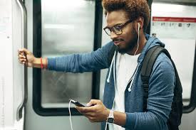 Image result for listening to music on the train