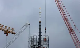Notre Dame reveals new spire and golden rooster as scaffolding removed