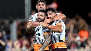"Star Players Lead Broncos to Victory despite Late Eels Scare"