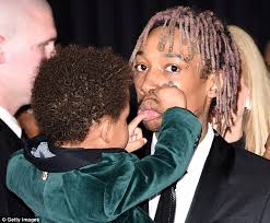 Wiz Khalifa plays doting dad at Grammy Awards with cute son ... via Relatably.com