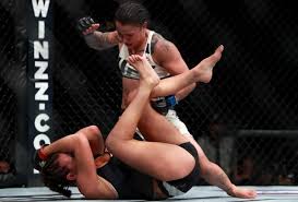 Image result for Miesha Tate announces retirement after loss at UFC 205