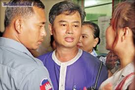 Heng Chheang, convicted of defrauding Senator Kok An in 2011, is seen outside court in February 2012. HONG MENEA - 2-Heng-Chheang