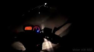 Resultado de imagem para imagem de farol de moto, em estrada escura