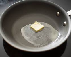 Gambar Heat the butter in a large skillet over medium heat