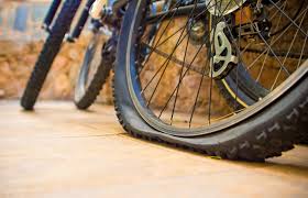 Image result for bike with flat tire
