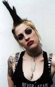 She also expands on her first encounter with her half-sister, punky singer Brody Dalle (born “Bree Robinson”), of The Distillers and Spinnerette fame: - brody01