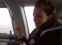 Enjoying the high life: Kate Goldsmith takes to the sky in a helicopter to travel between a Jay Z and Kanye West concert - article-2154255-136D9EBC000005DC-6_638x466